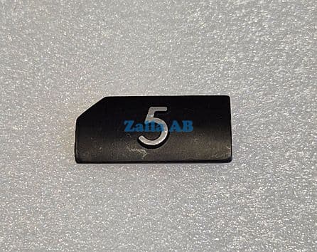 PRESSEL,RELIEF BLACK SYMBOL 5